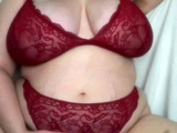 Big boobed Memphis masturbates in a bodystocking